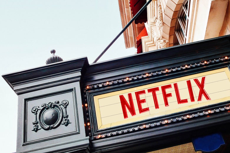A movie theater marquee with the Netflix logo.